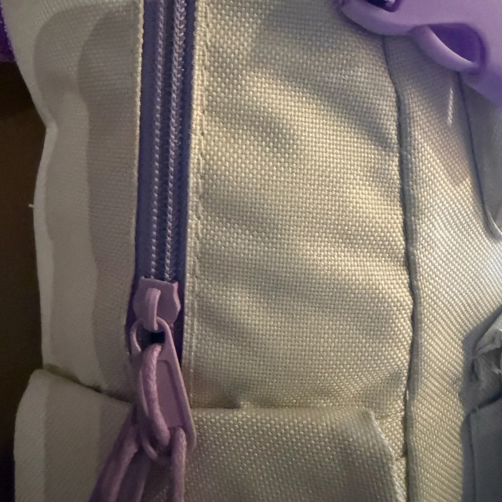 Cream Backpack with Purple Accents and Plush Keychain